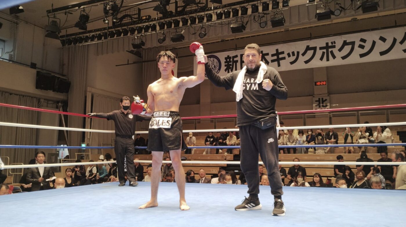 Diego Gonzalez La Volpe cornering a winning fighter at a Shin Nihon Kickboxing event in Japan
