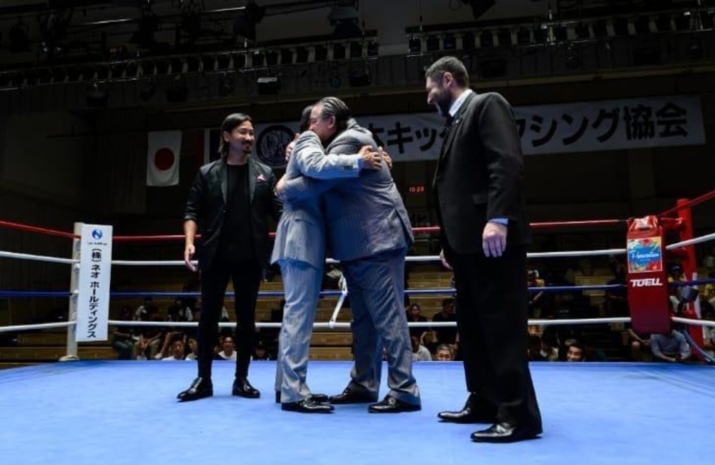 Ihara Kaicho and Chinto Mordillo embrace during the official presentation in the ring, Japan